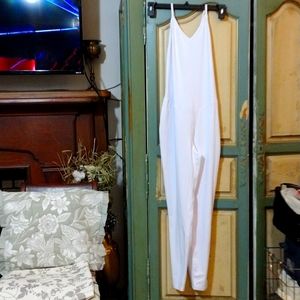 Cool run white vertical/ horizontal stretch jumpsuit sxL.  BRand new.